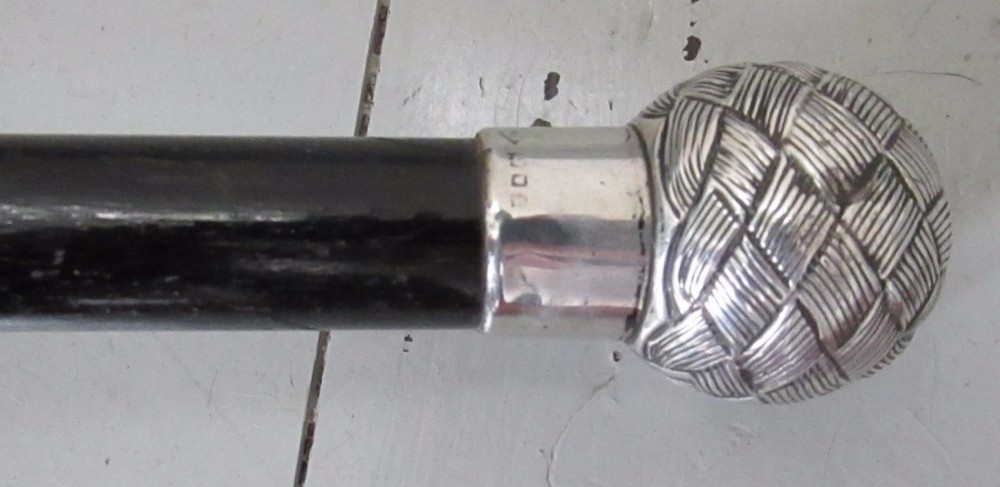 edwardian silver ebonised walking cane tapering shaft sailers knot pommel