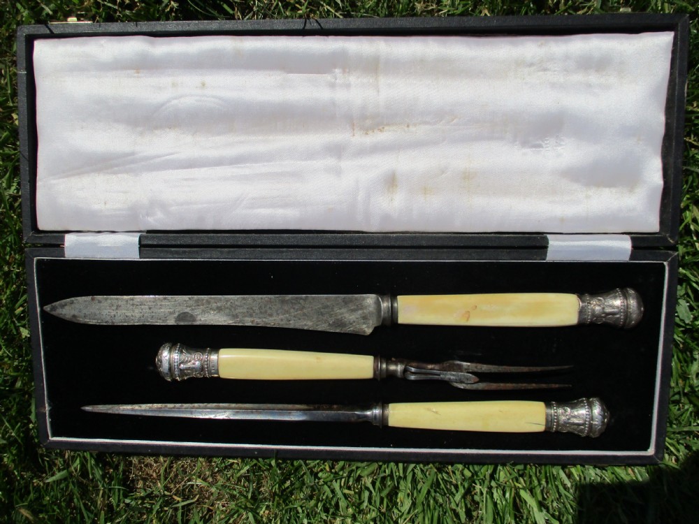 c1900 ivory rams head silver and steel carving set